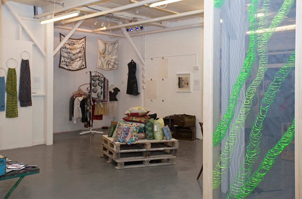 Gallery: clockwise from left work by Linda Row, Penny Wheeler and Anna Glasbrook with cushions by Samon Yechi, Lyn Snow and Penny Wheeler on the pallets