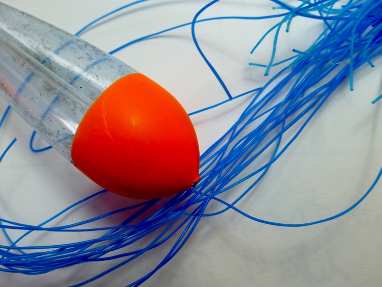 These beach finds have been sitting on my window ledge for months because I love the orange/blue colour  combination. The blue deconstructed fishing line is proving interesting to stitch with